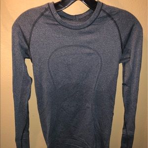A long sleeve fitted Lululemon top.